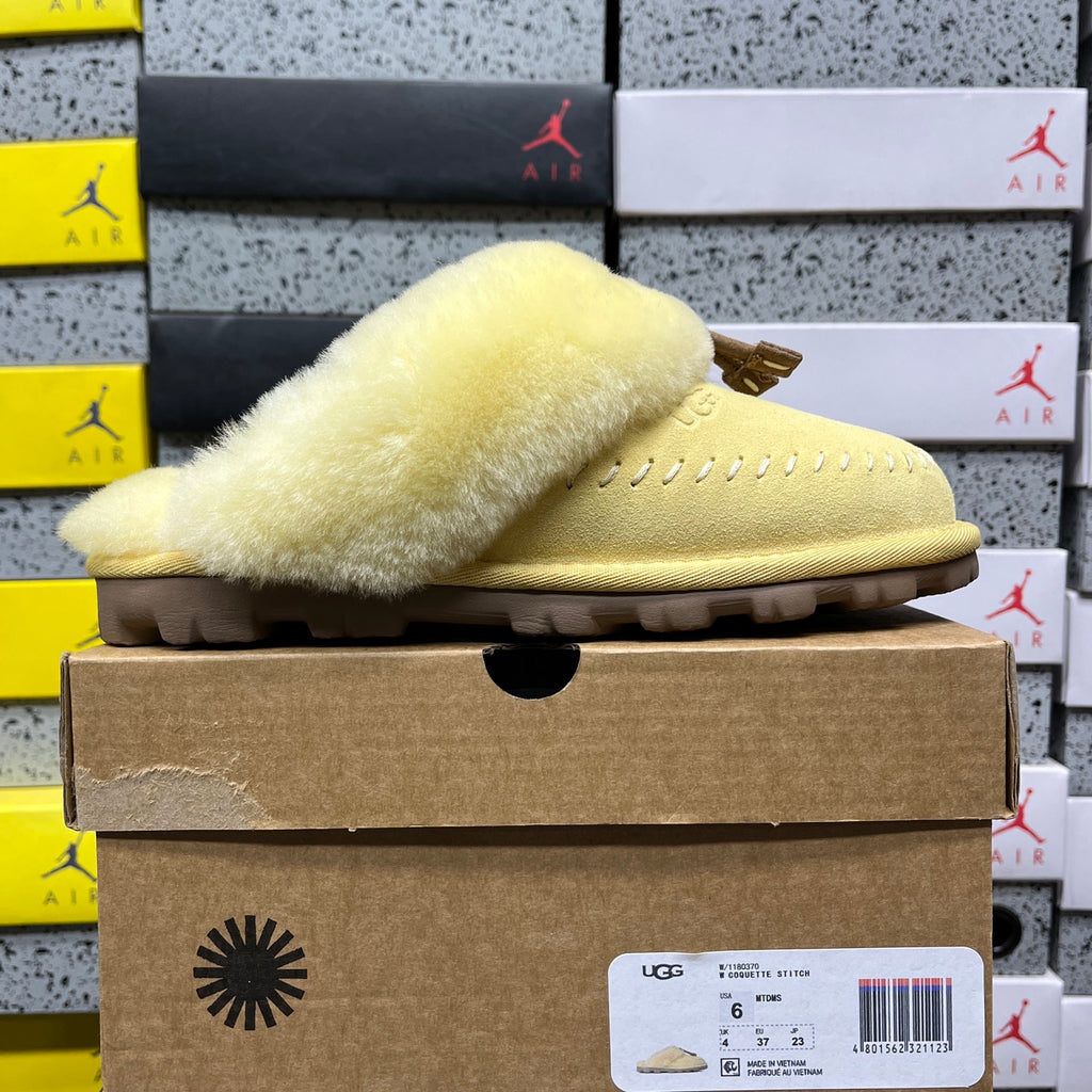 UGG Soft Yellow Slippers with Plush Collar and Stitch Detail