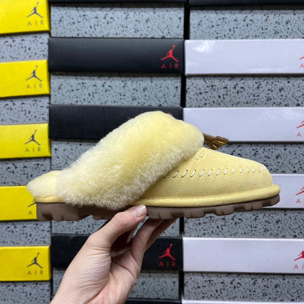 UGG Soft Yellow Slippers with Plush Collar and Stitch Detail