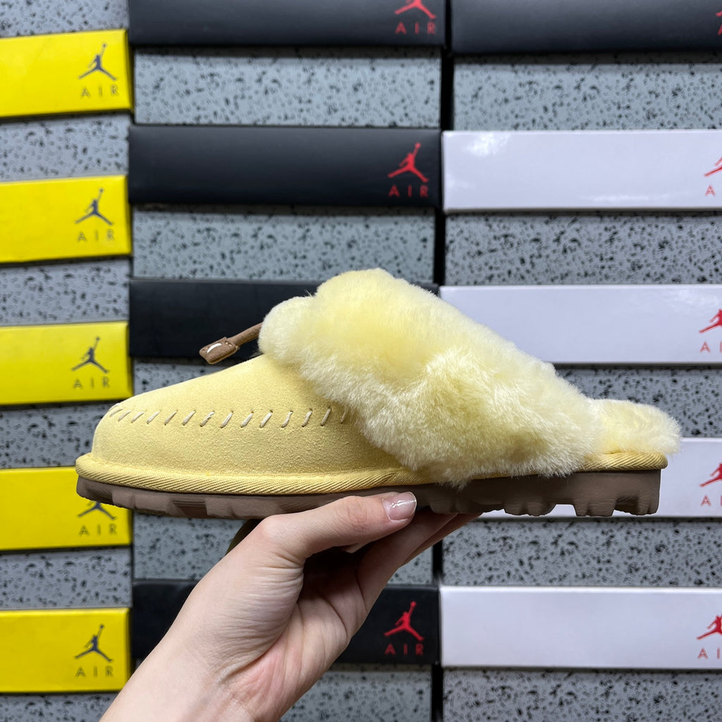 UGG Soft Yellow Slippers with Plush Collar and Stitch Detail